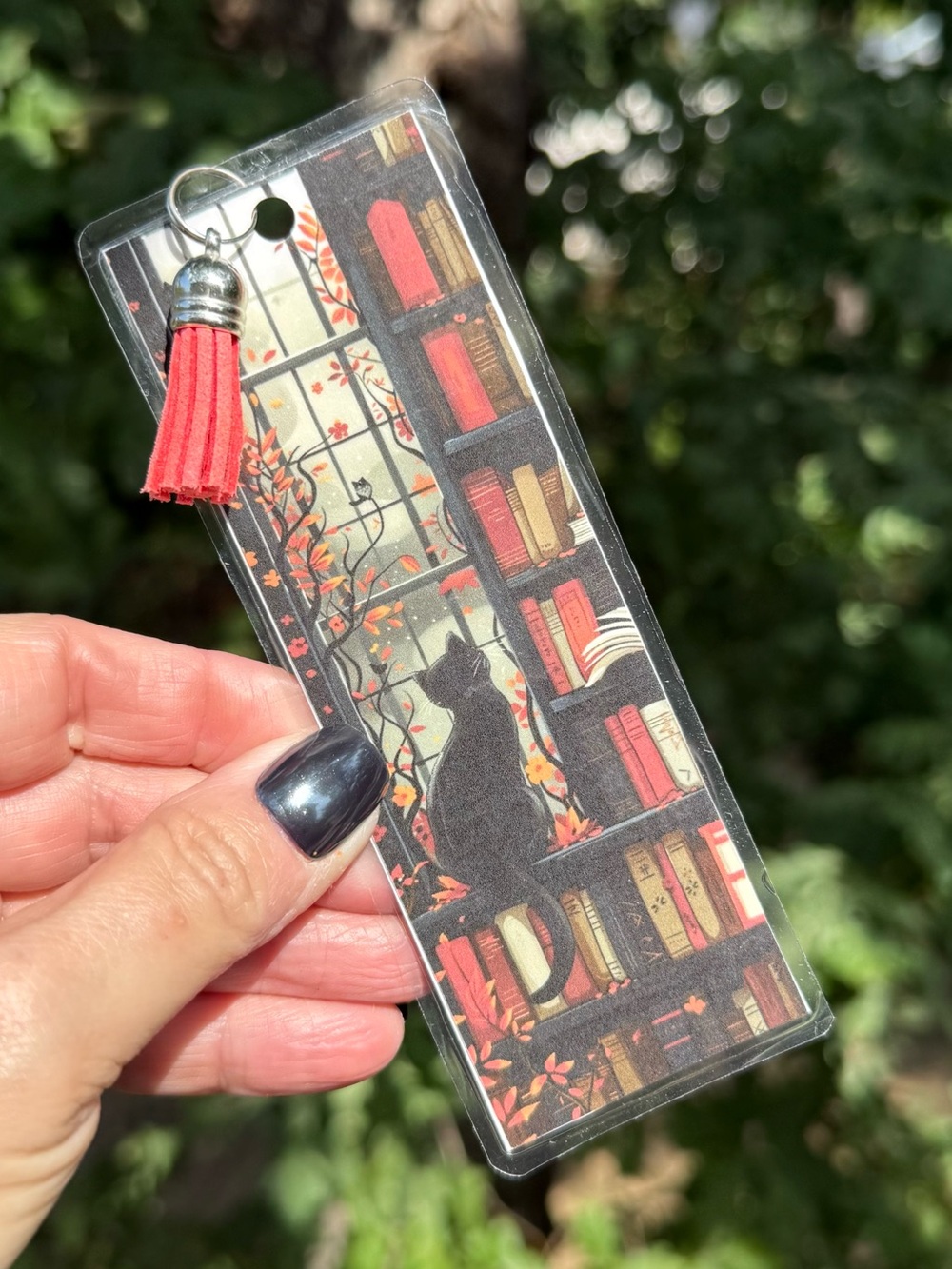 Hand Crafted double-sided laminated bookmark with faux leather tassel